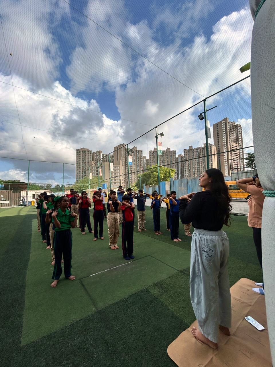 A guided yoga session for school students